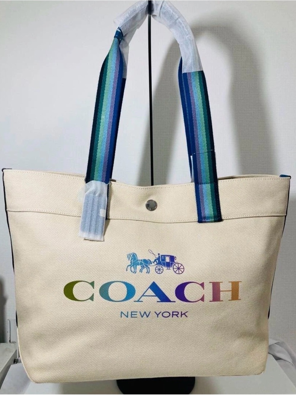 Coach Cream Canvas Tote with Rainbow Logo and Blue-Green Striped Handles